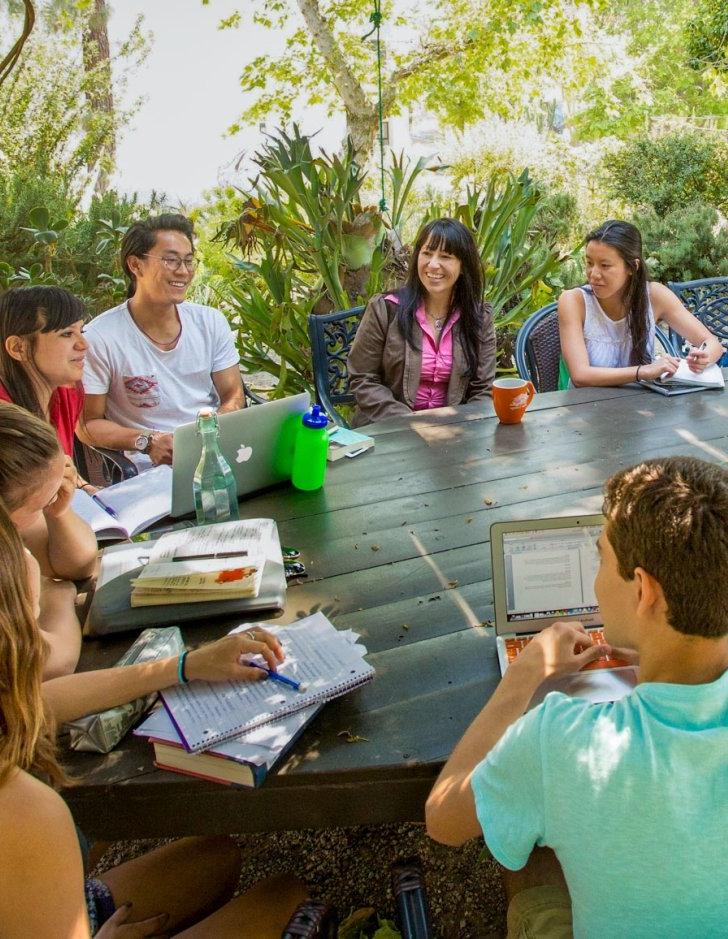 sociology class conducted in an outdoor classroom